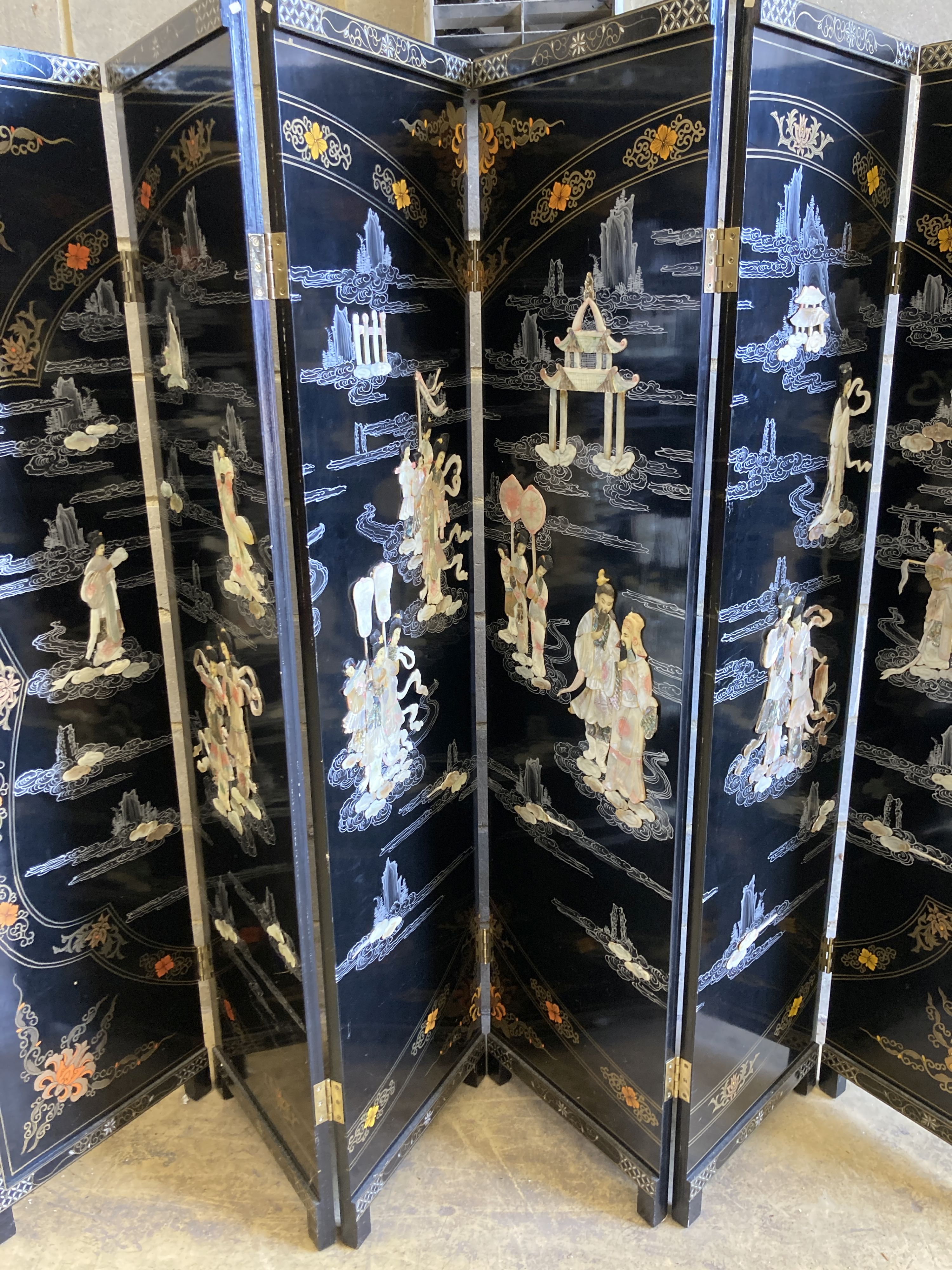 A 1920's - 30s Chinese inlaid mother of pearl six fold screen, each panel 45cm wide, height 183cm 72 x 95ins